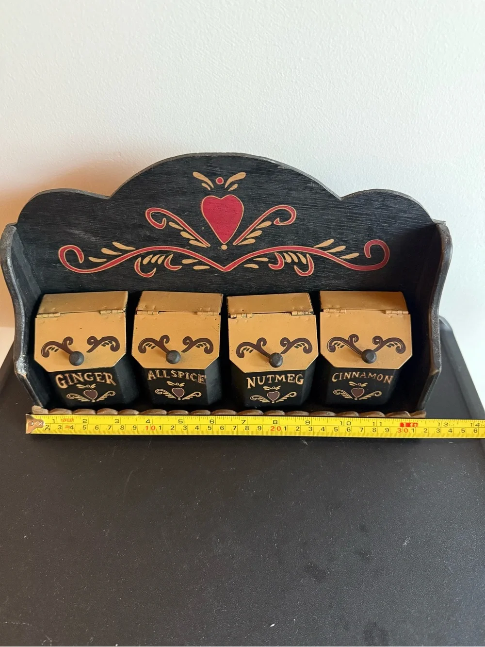 Vintage Folkart tin spice containers with wooden shelf